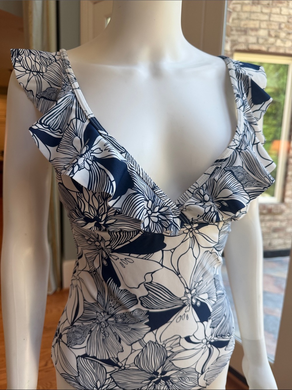 Stella Parker Navy and White Floral Ruffle One-Piece swimsuit